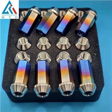 Sudegusios titano auselės veržlės